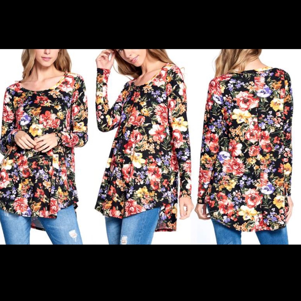 Women’s tunic top sizeM/L.  Floral